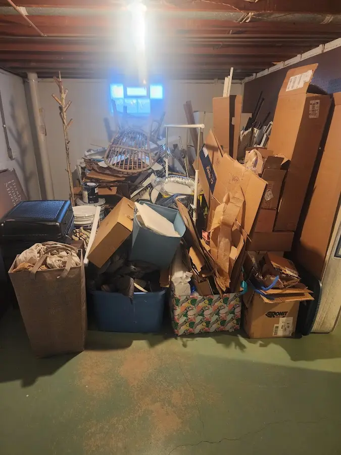 Roll-off dumpster container at job site for 15 Yard Dumpster Rental in Zeeland